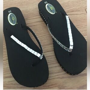Black Flip Flops with Silver Accents
